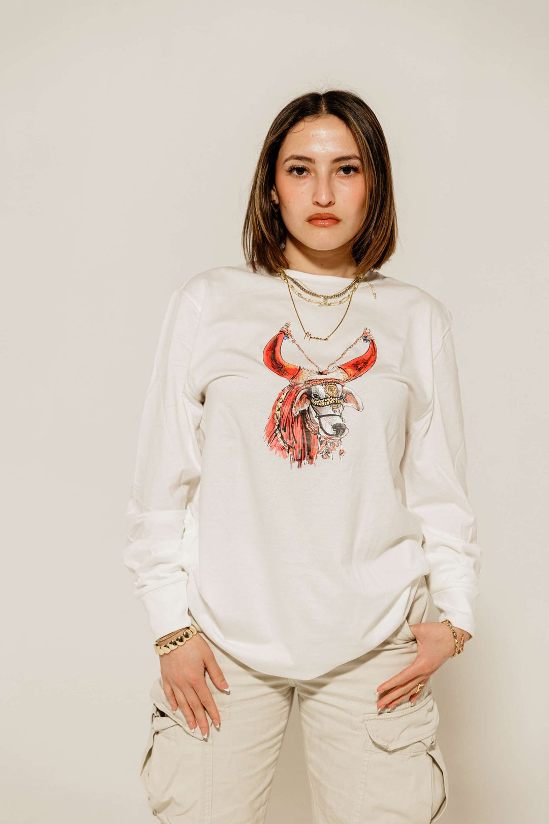 a female model wearing red bull Nandi Tee - 1