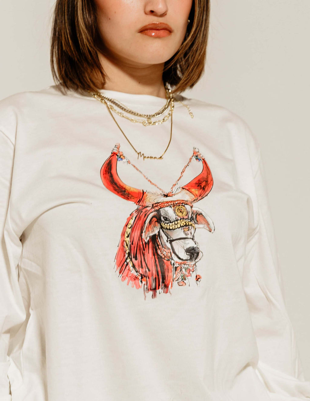 a female model wearing red bull Nandi Tee - 2