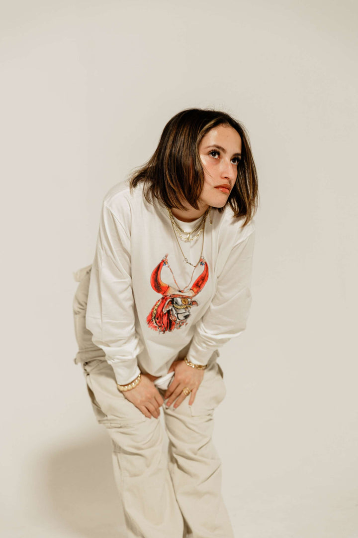 a female model wearing red bull Nandi Tee - 8