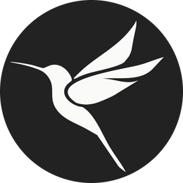 White silhouette of a hummingbird on a black circular background
